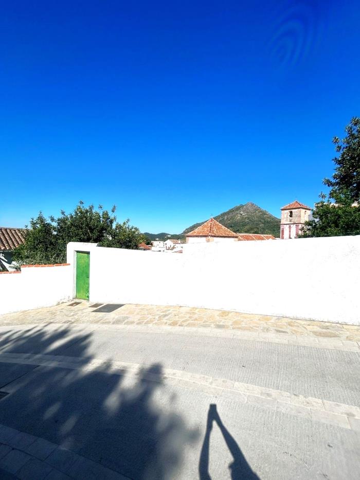 Property with a garden and the possibility of a large garage.