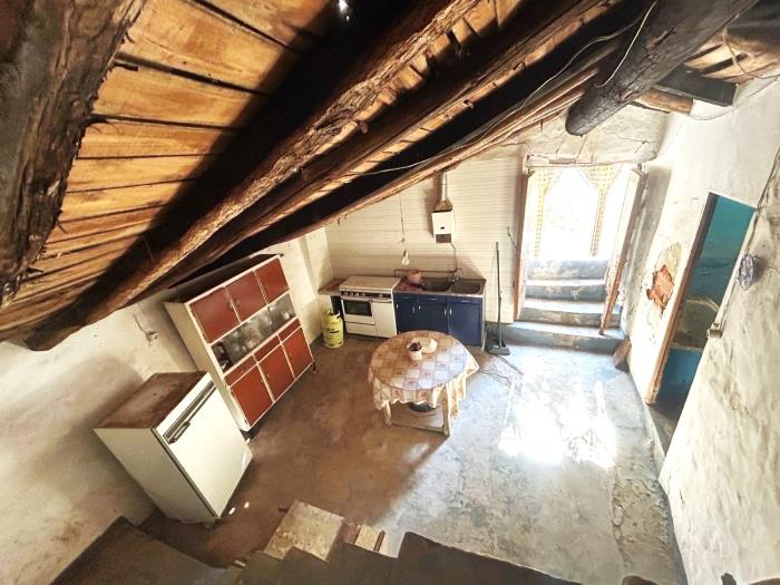 Property with a garden and the possibility of a large garage.