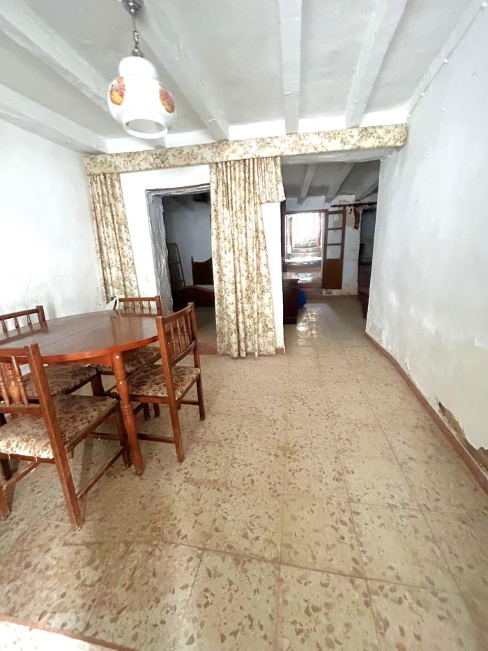 Property with a garden and the possibility of a large garage.